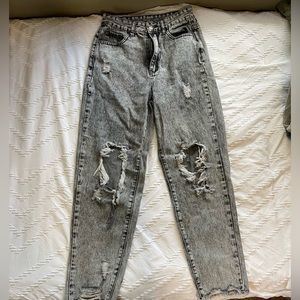 HIGH WAISTED RIPPED JEANS